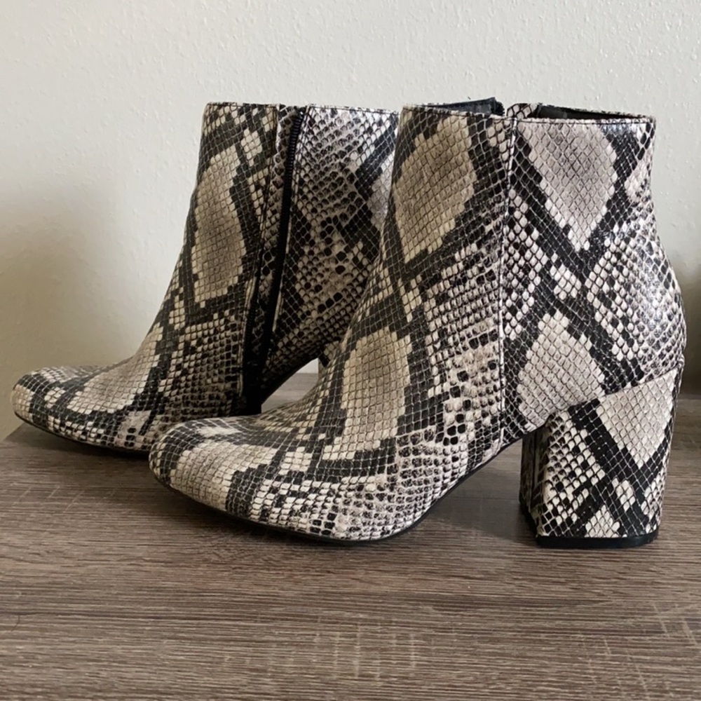 Brand new boutique snake boots